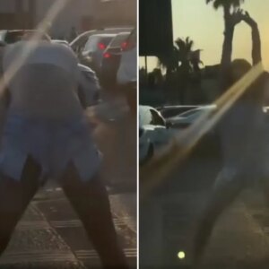 genc kadin araclara aldiris etmeden yol ortasinda dans etti iVdVQ131